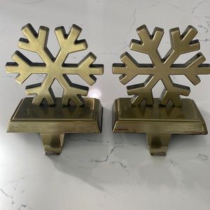 Gold snowflake stocking holders